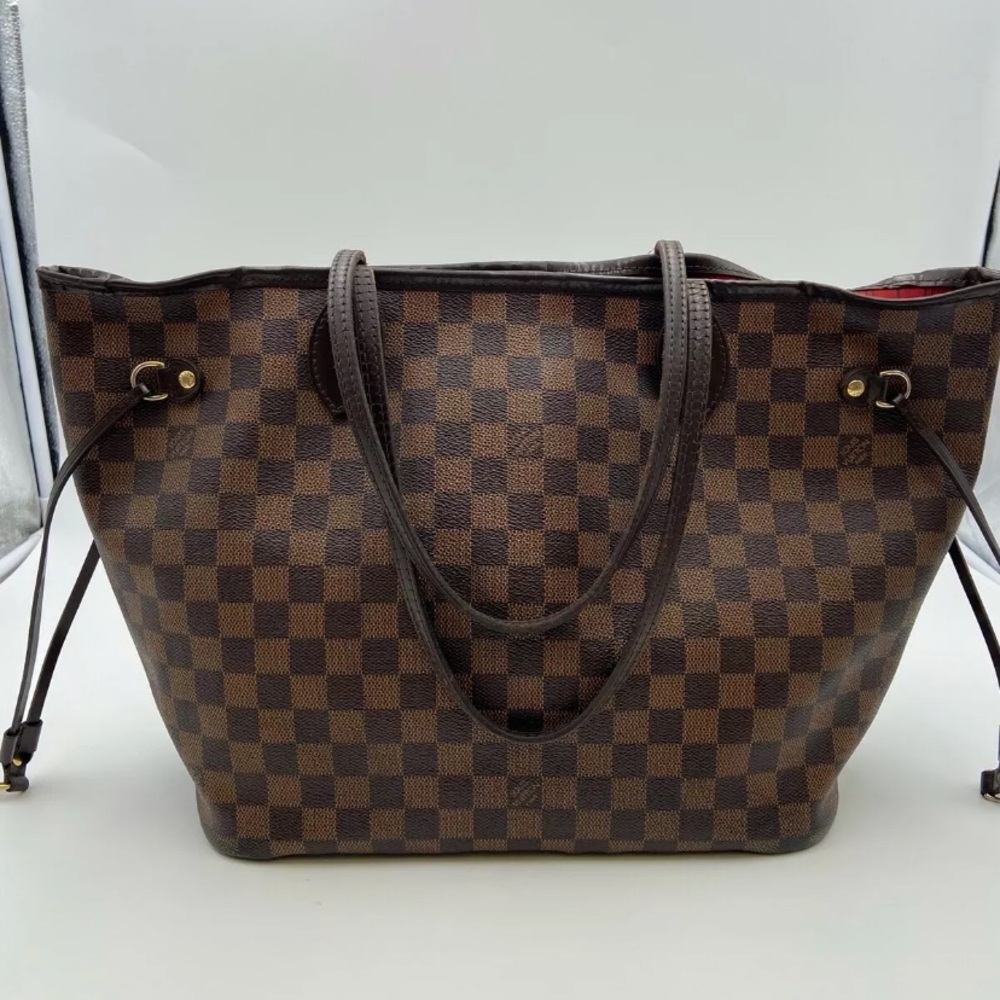 Authentic Louis Vuitton never full MM. Made in Spain with code CA4171.
